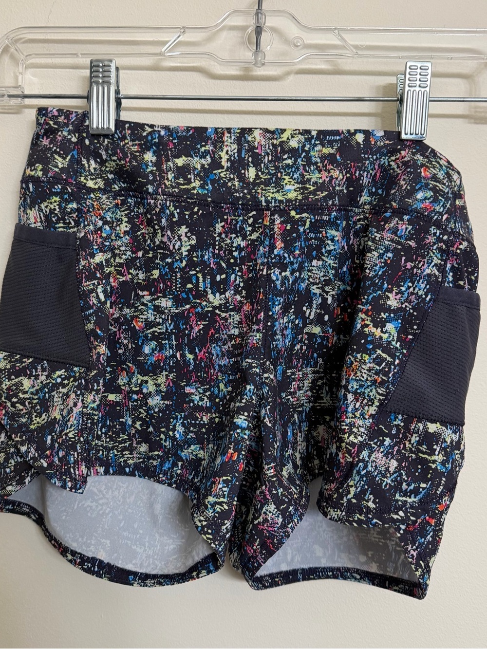 Athleta Black Shorts with Multicolor Paint-Splatter Print
